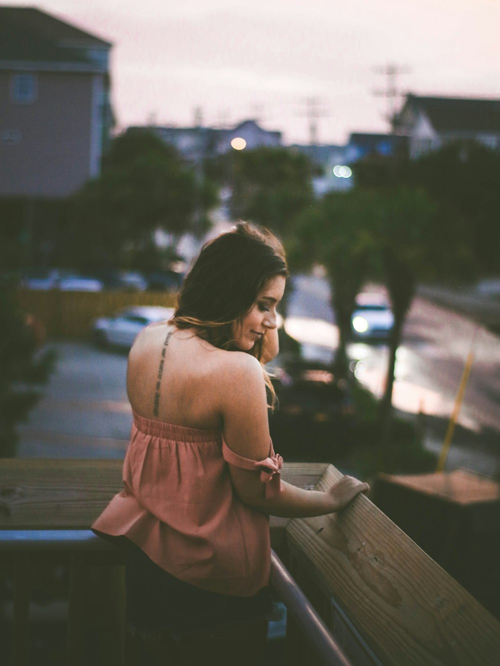 woman standing in balcony