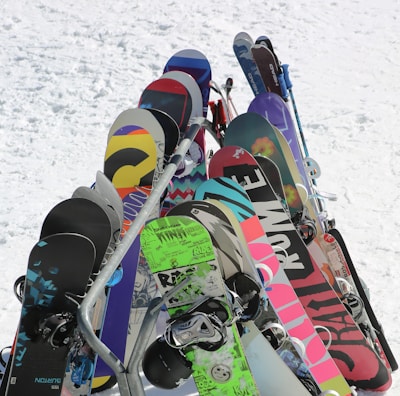 A ridesleeve laid out flat beside snowboards, highlighting its lightweight design.