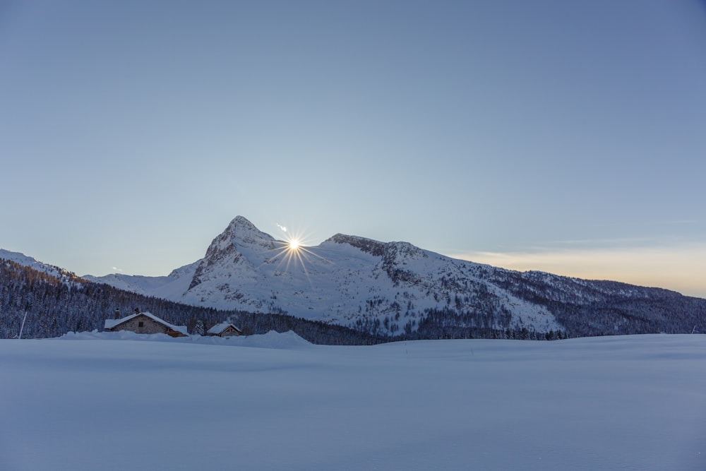 mountain coated in white snow