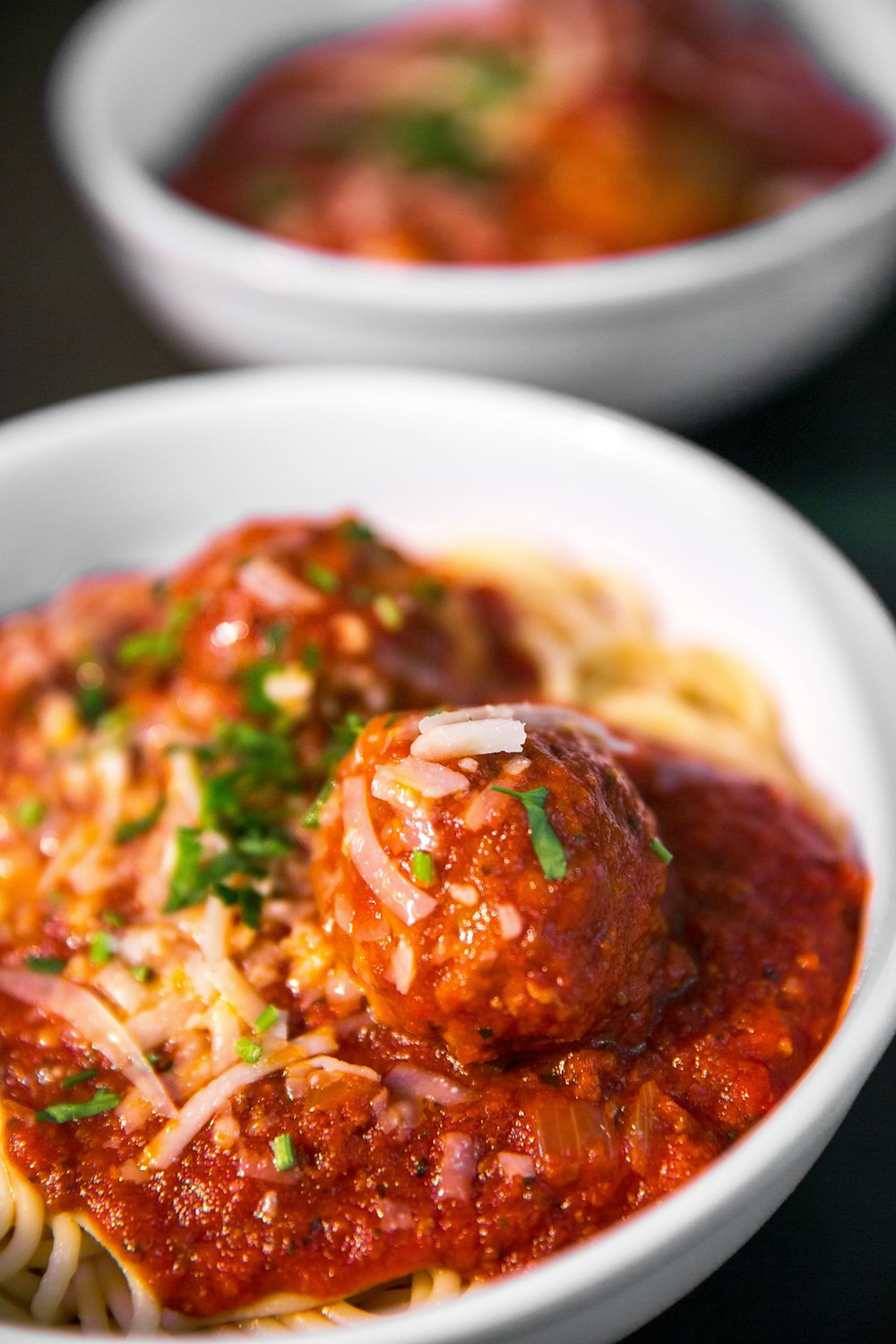 meta balls with noodles served on white ceramic bowl