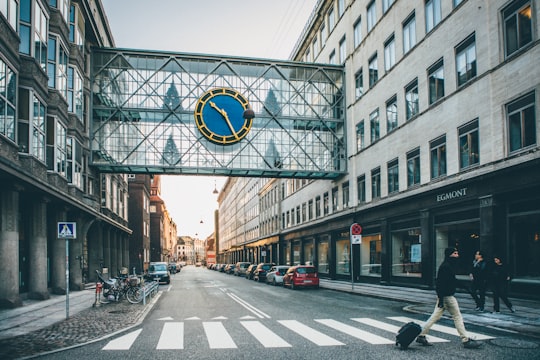 people walking on street surrounded by buildings during daytime in København K Denmark