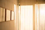 room with white window curtains