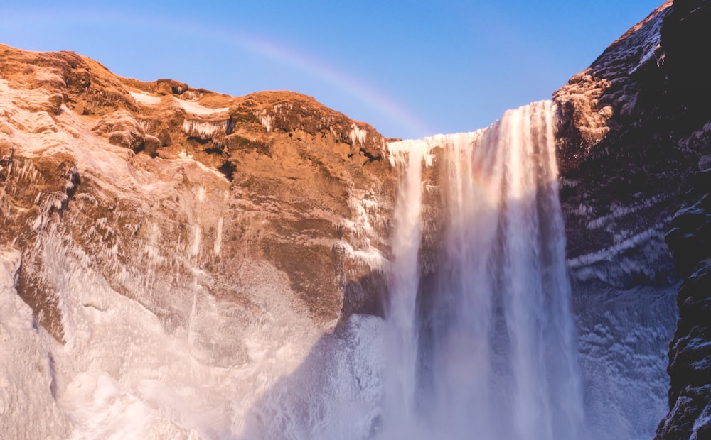 worms-eye view photography of water falls