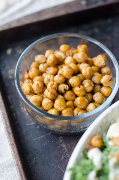 yellow corn on glass bowl