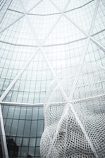 low angle photography of glass building