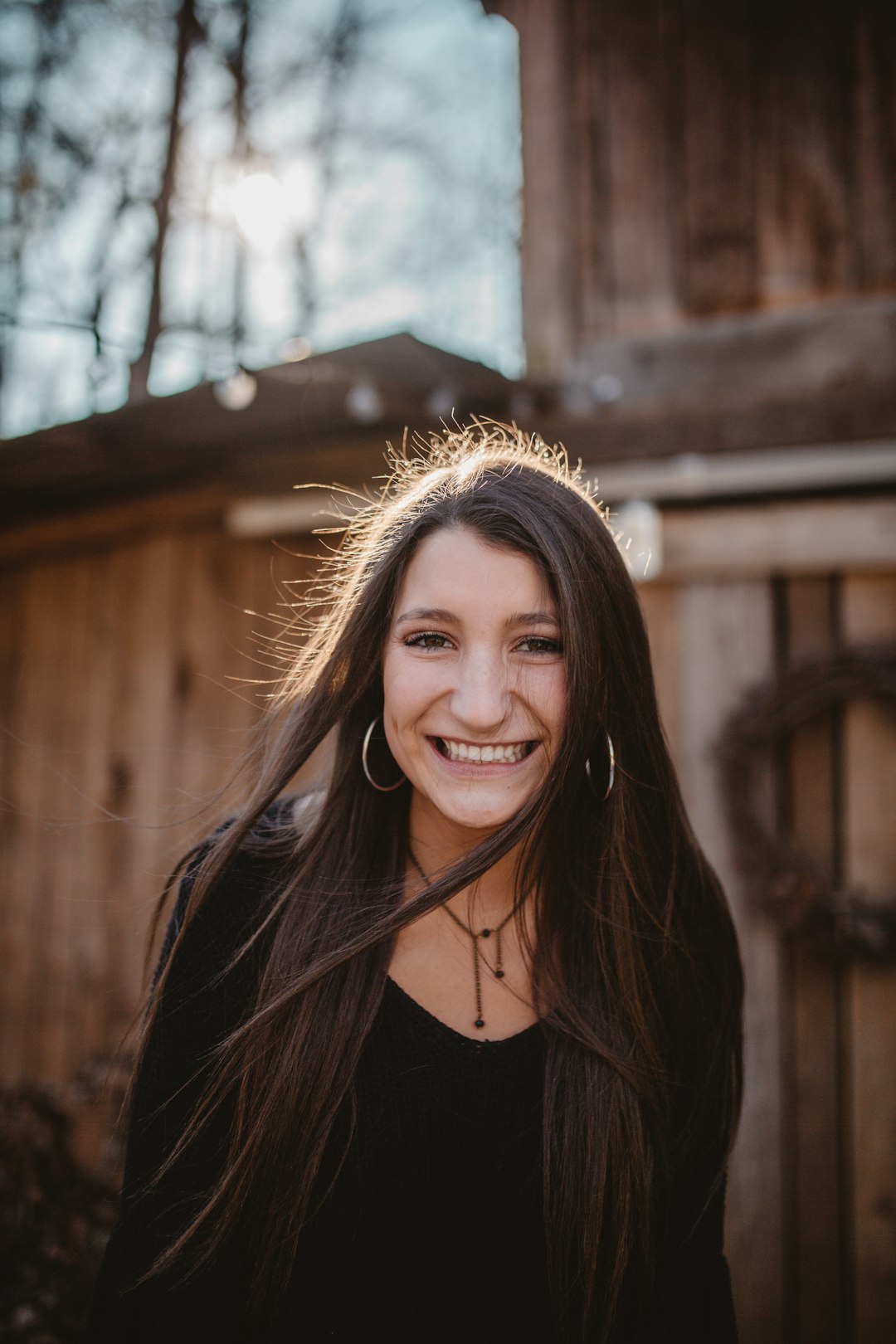 woman wearing black shirt smiling photography