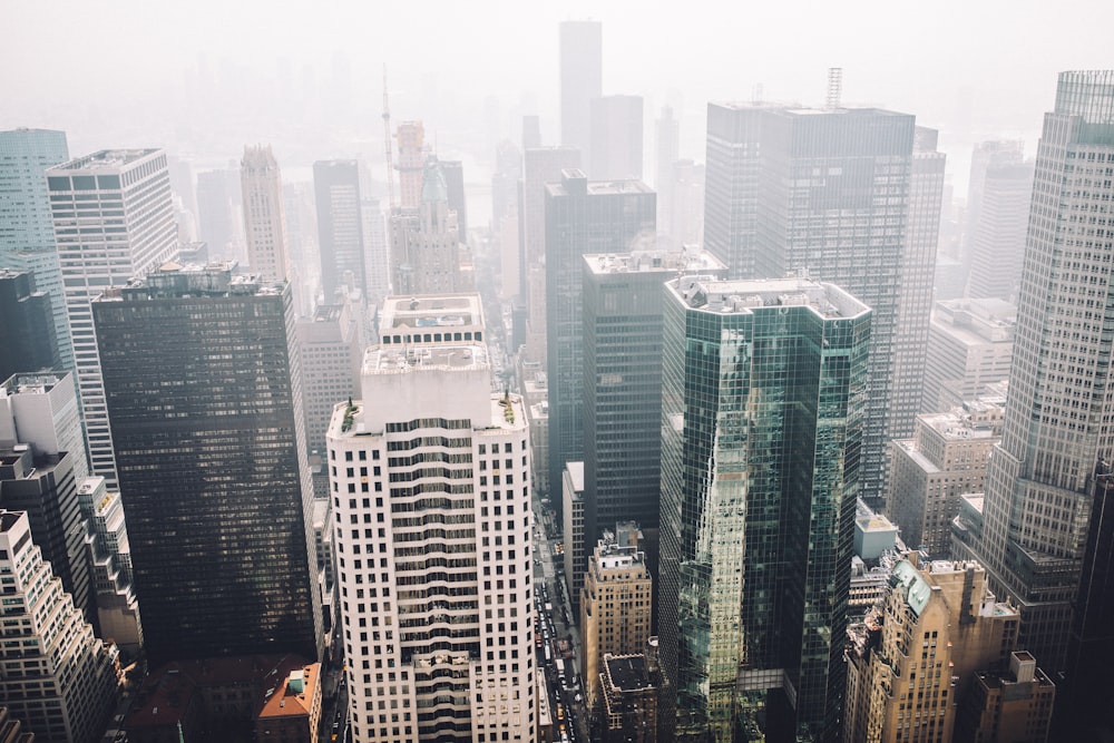 aerial photography of foggy cityscape