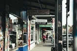 woman walking through stores
