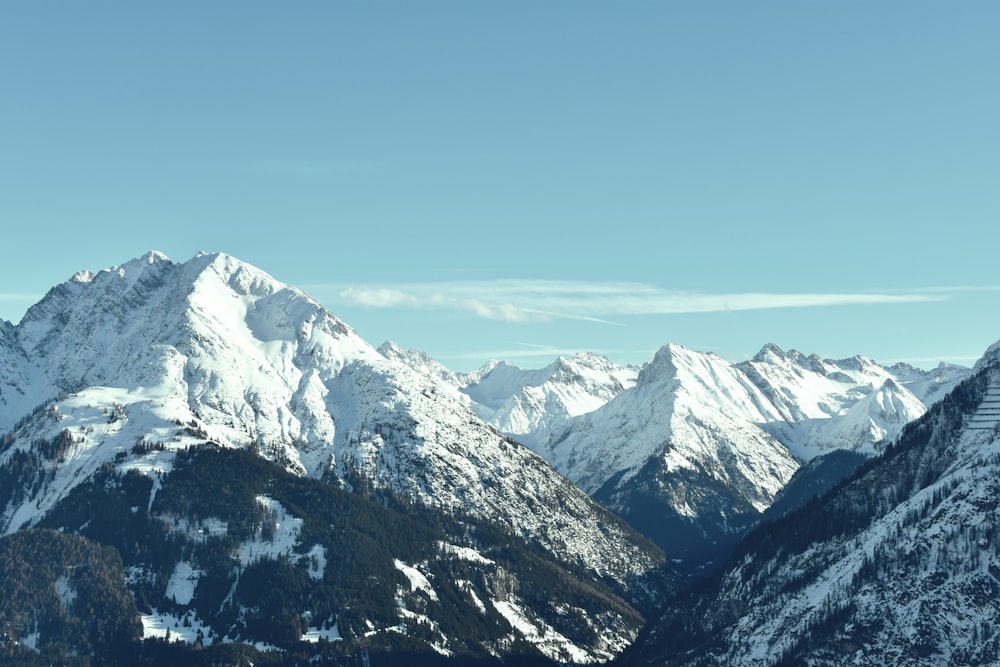 mountain covered by snow at daytime