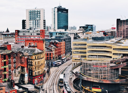 aerial photography of concrete buildings at daytime in Manchester United Kingdom