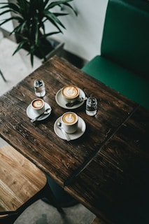 three latte arts in cup