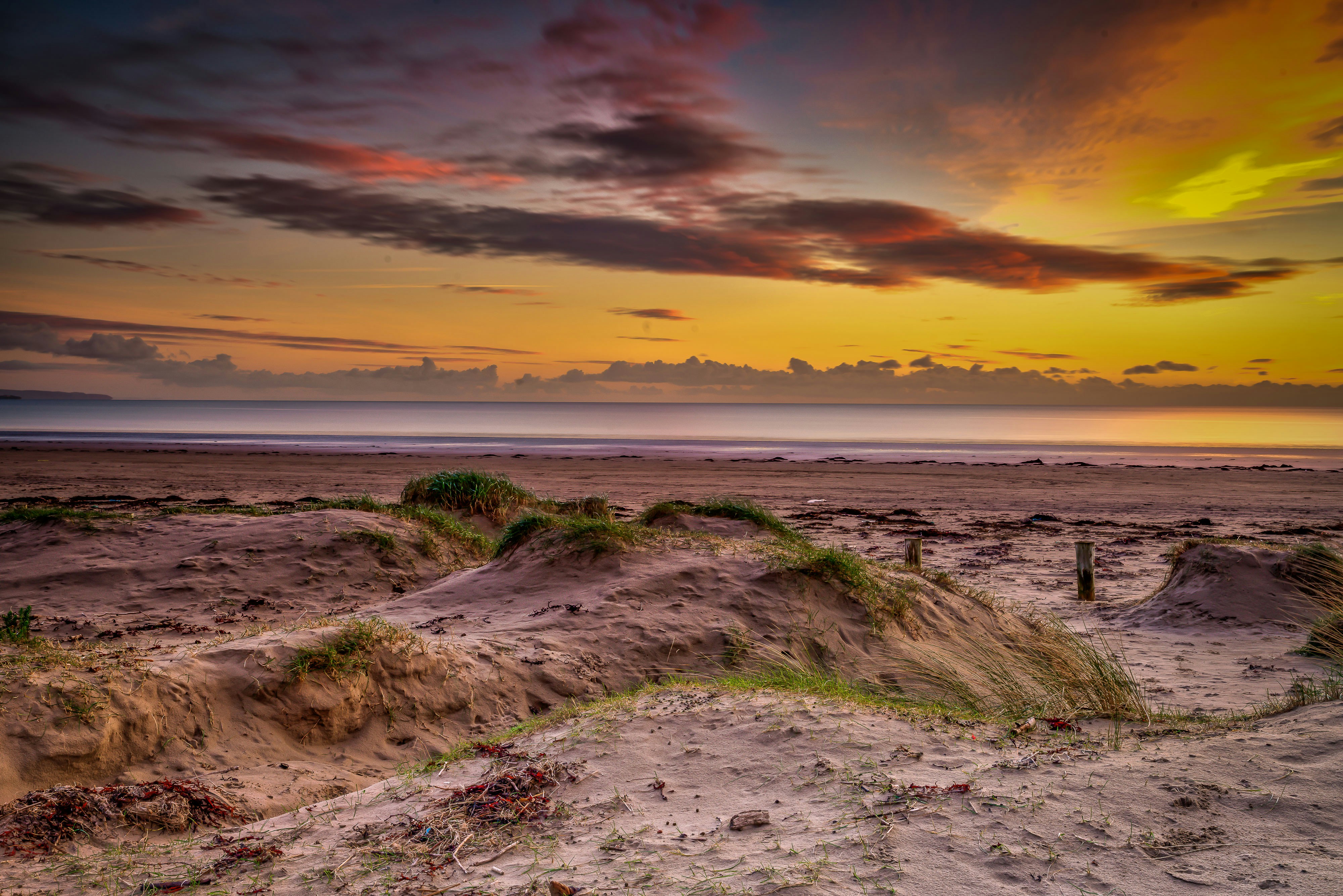 sand horizon under yellow sky