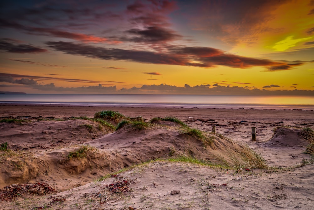 sand horizon under yellow sky