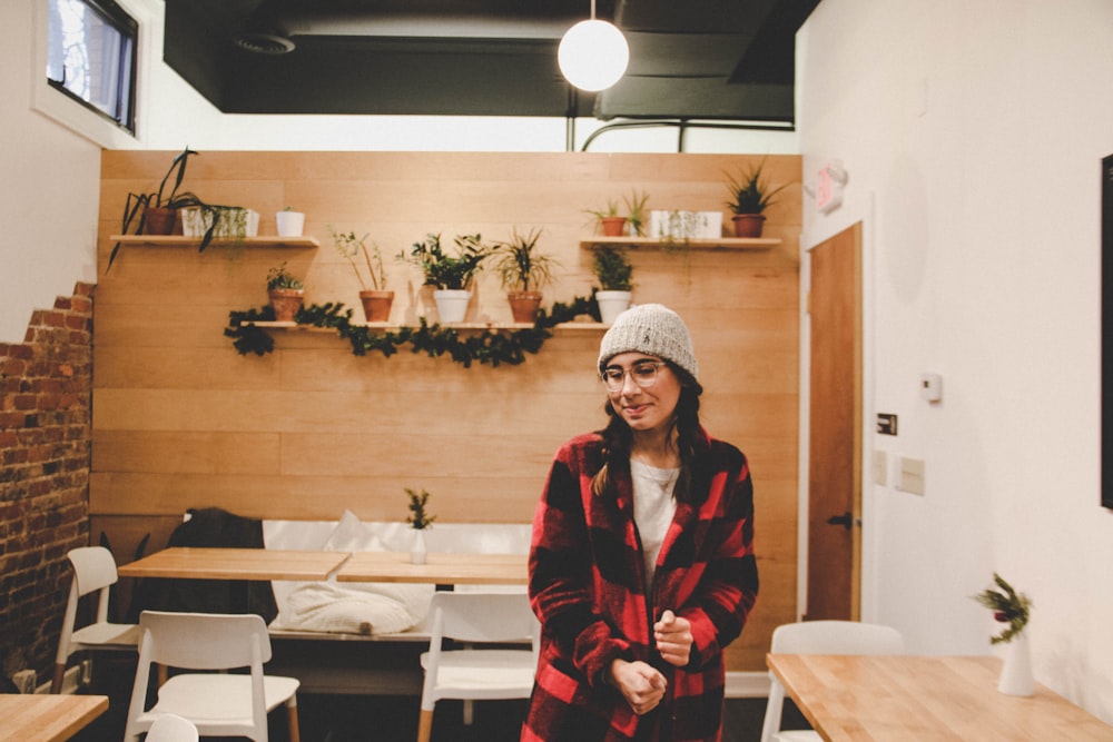 woman standing in dining room