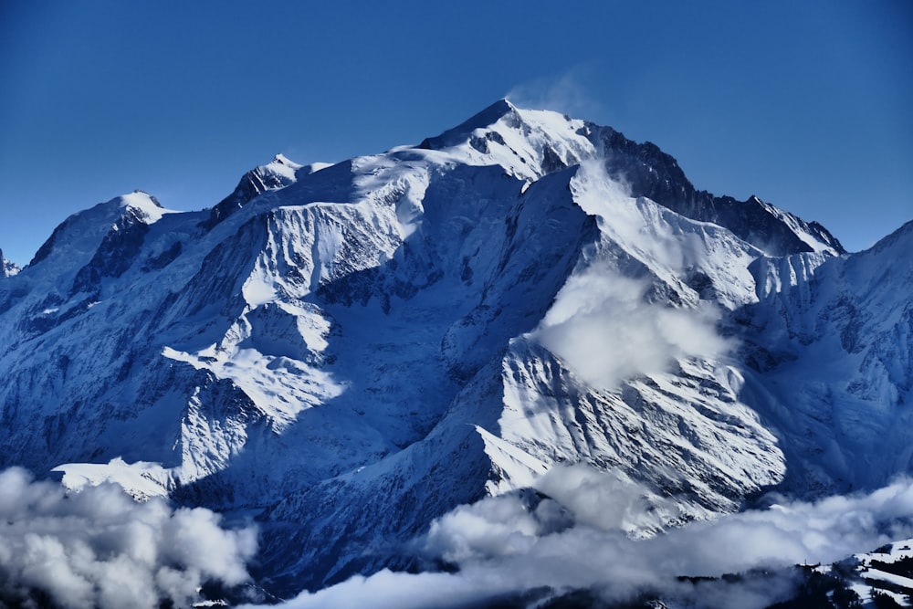 mountain covered with snow during daytime photography