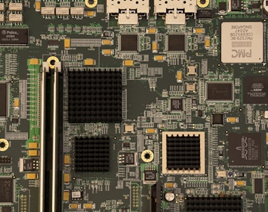 closeup photography of green and black computer motherboard