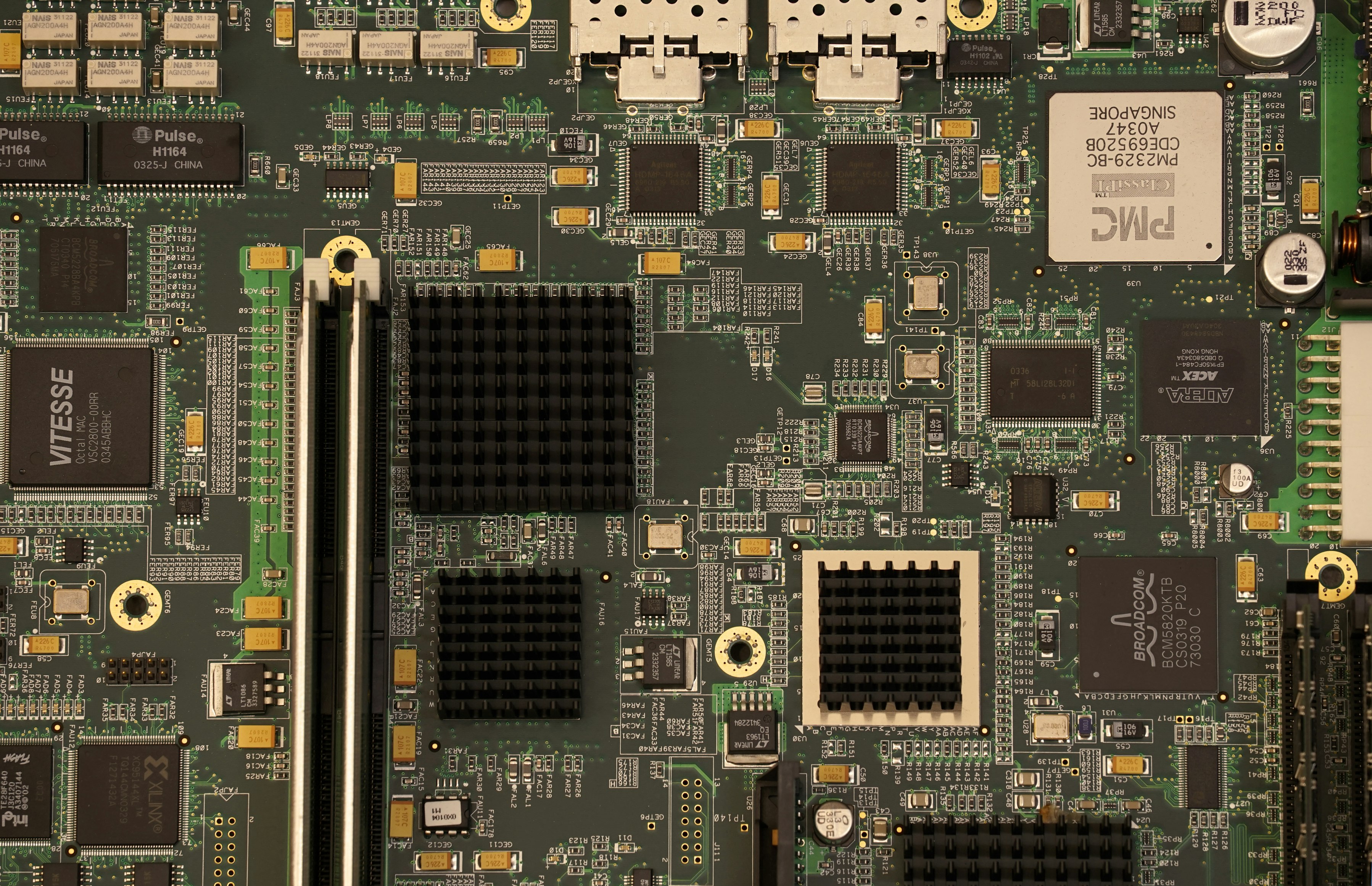 A circuit board close up with various chips and slots