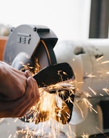 person welding steel