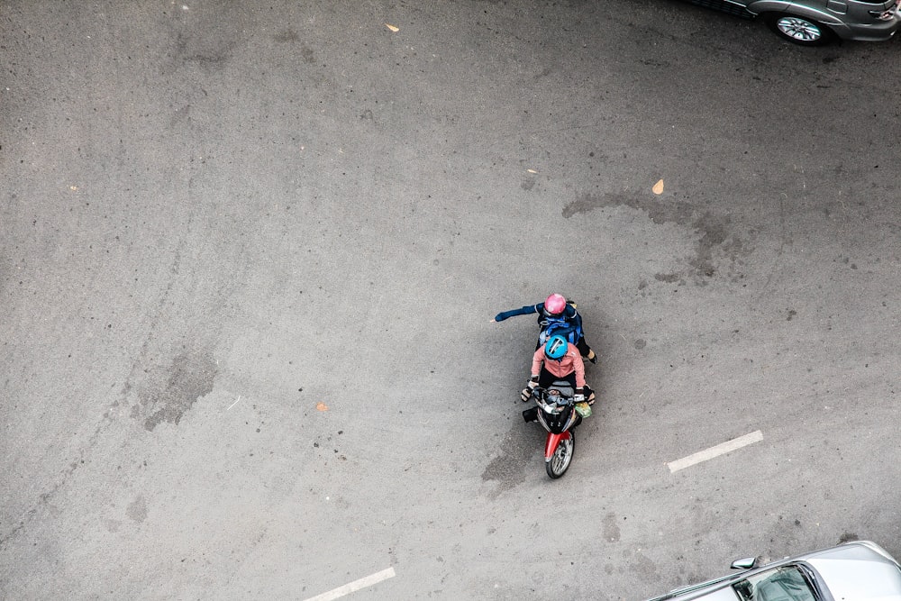 two person riding on bicycle