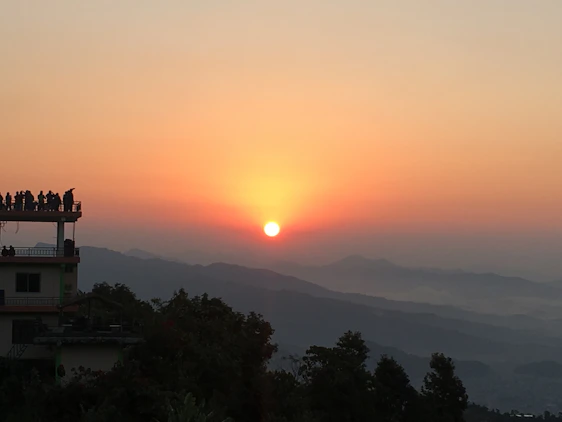 Sunrise over the Ganga River viewed from the rooftop of a cozy homestay in Varanasi.
