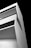 A modern, minimalist architectural structure with angular lines and large, dark windows. It is composed of white concrete and is set against a stark, black background, enhancing its geometric design.