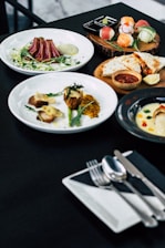 roasted meat served on white ceramic plates