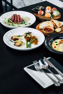 roasted meat served on white ceramic plates