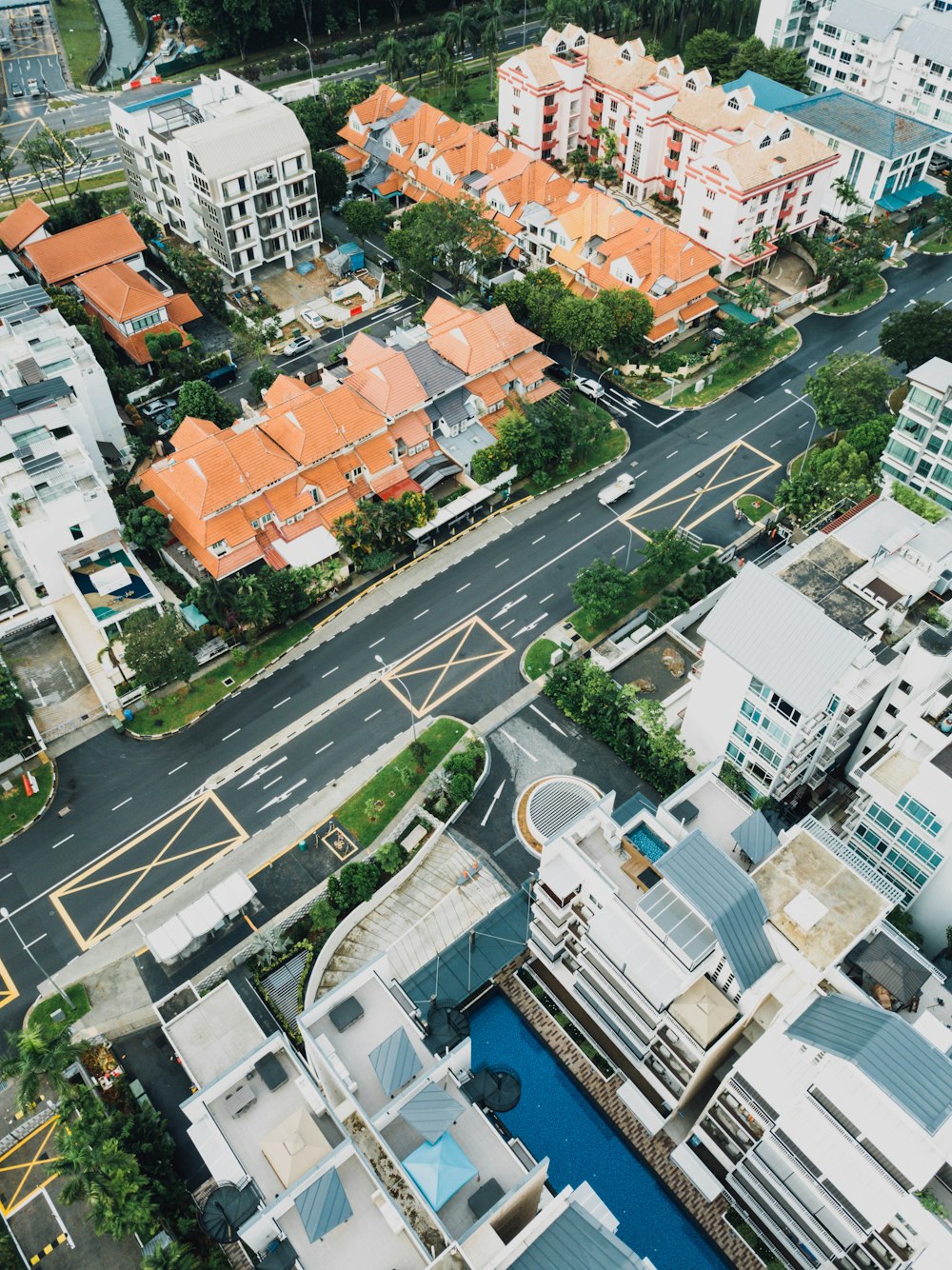 aerial photo of orange and white buildings during daytime