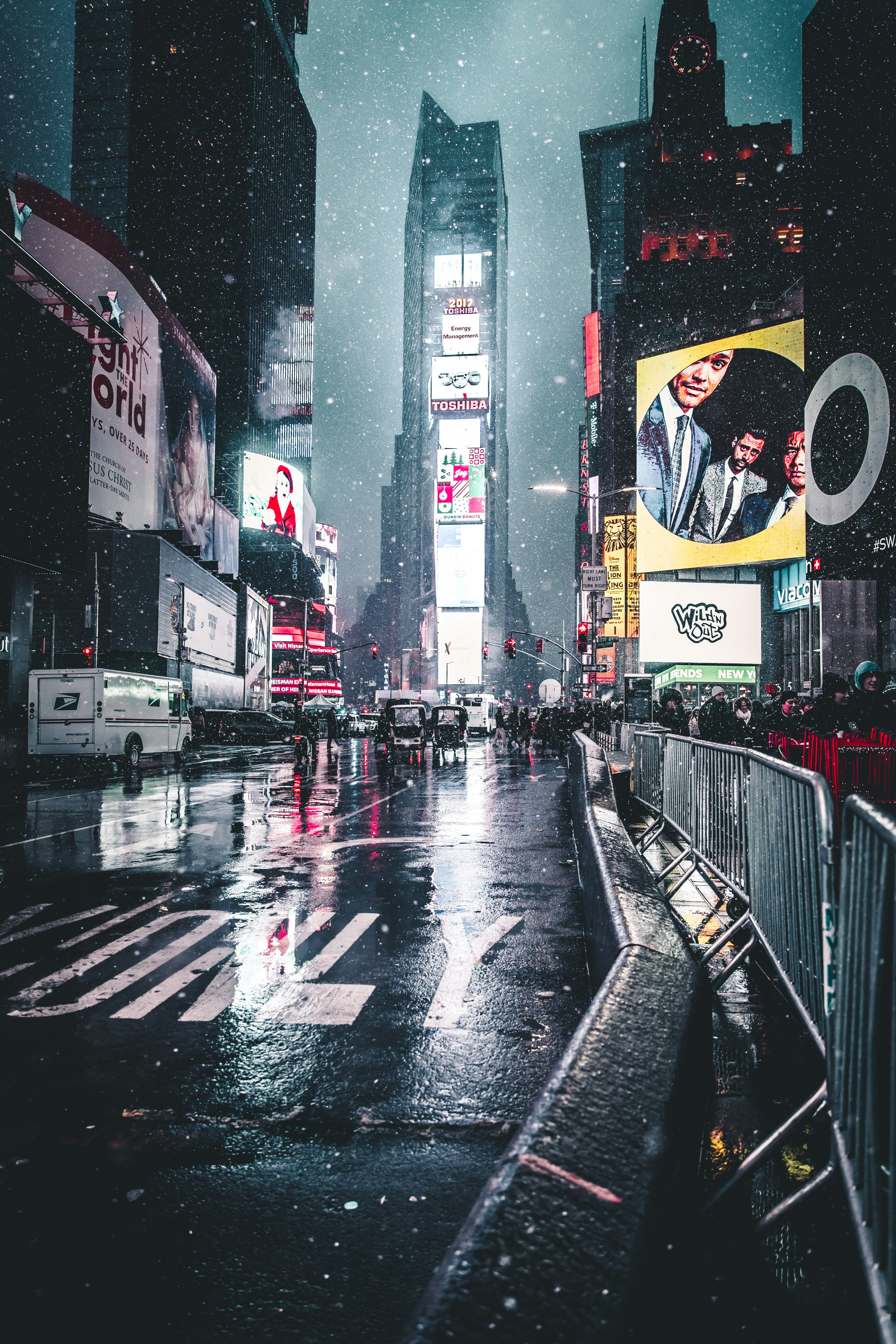 great photo recipe,how to photograph neon snowstorm.; group of people behind barricades on sidewalk during nighttime