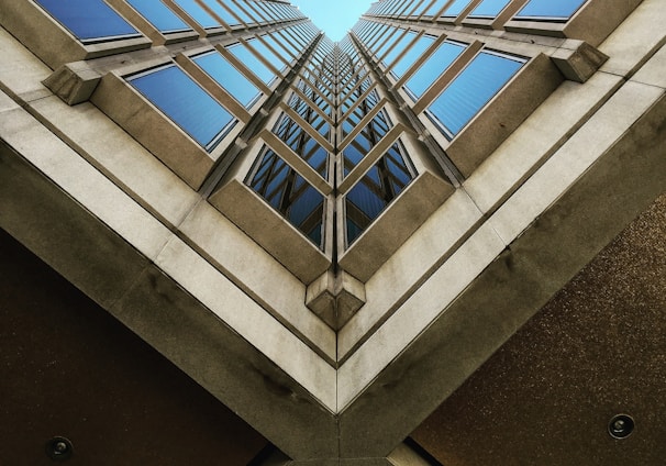 low angle view photography of brown high rise building