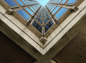 low angle view photography of brown high rise building