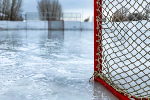 red and white hockey goal