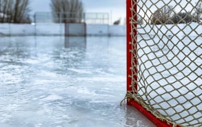 red and white hockey goal