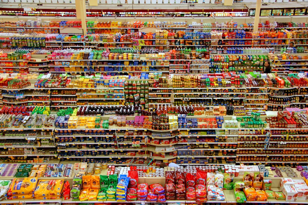 Aerial view of a grocery store aisle representing America's consumer economy