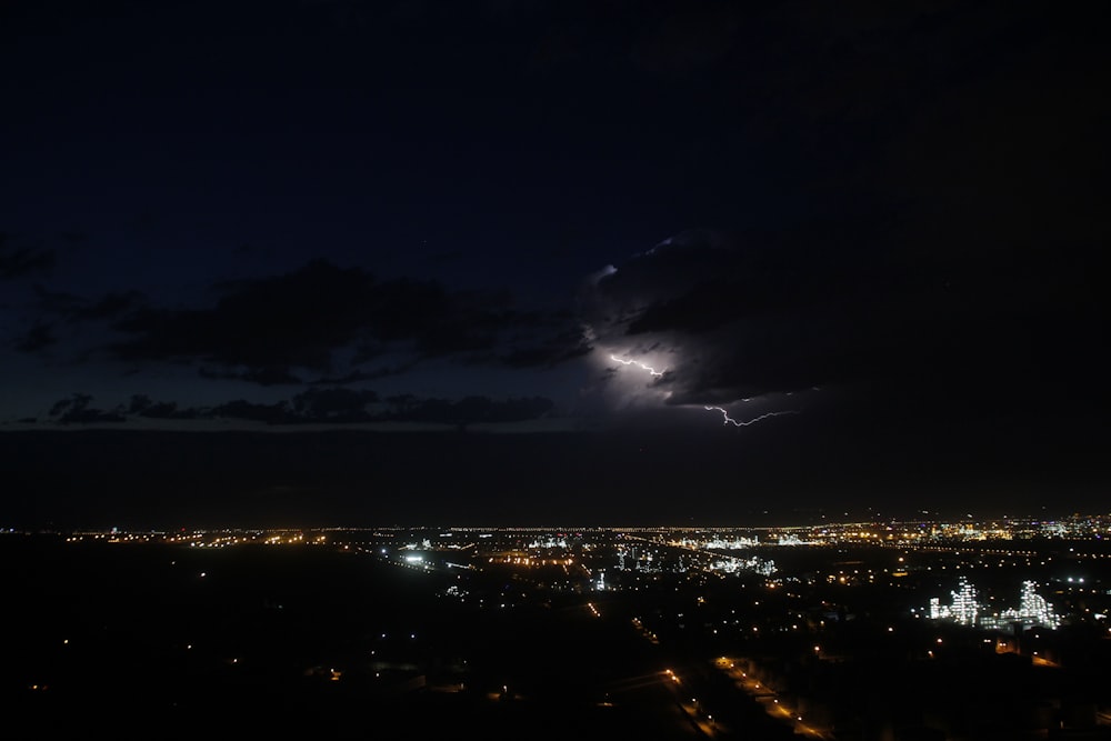 photo of lightning above city