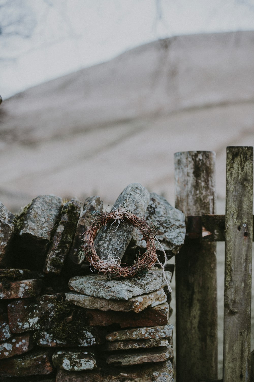 brown wreath on stones