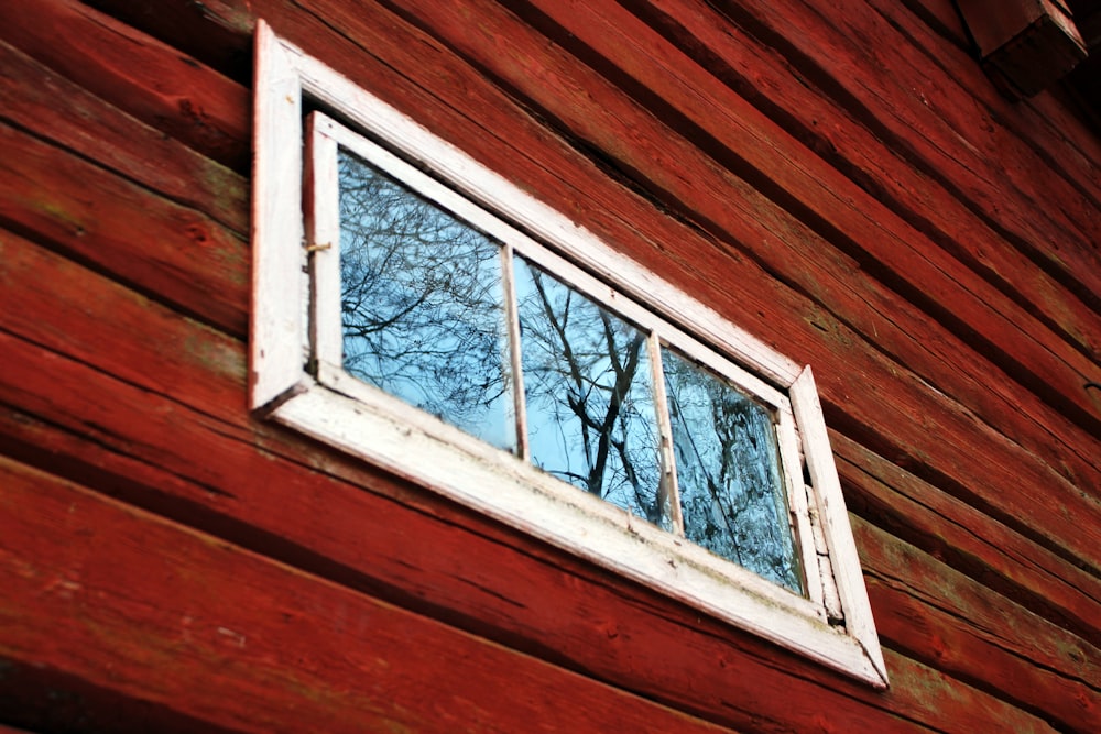 white wooden framed glass window pane