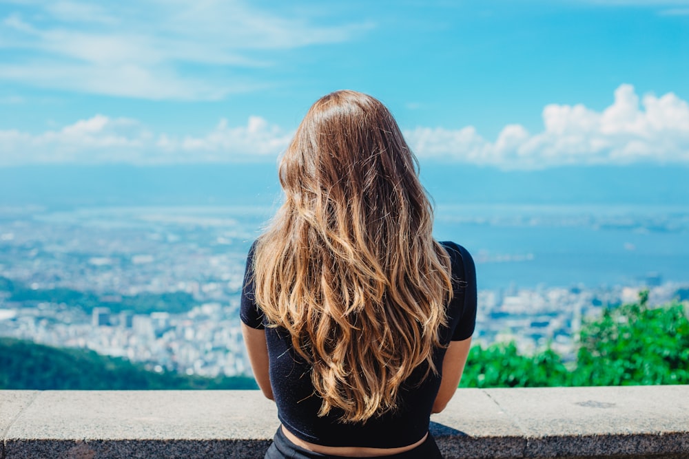 woman standing on balcony