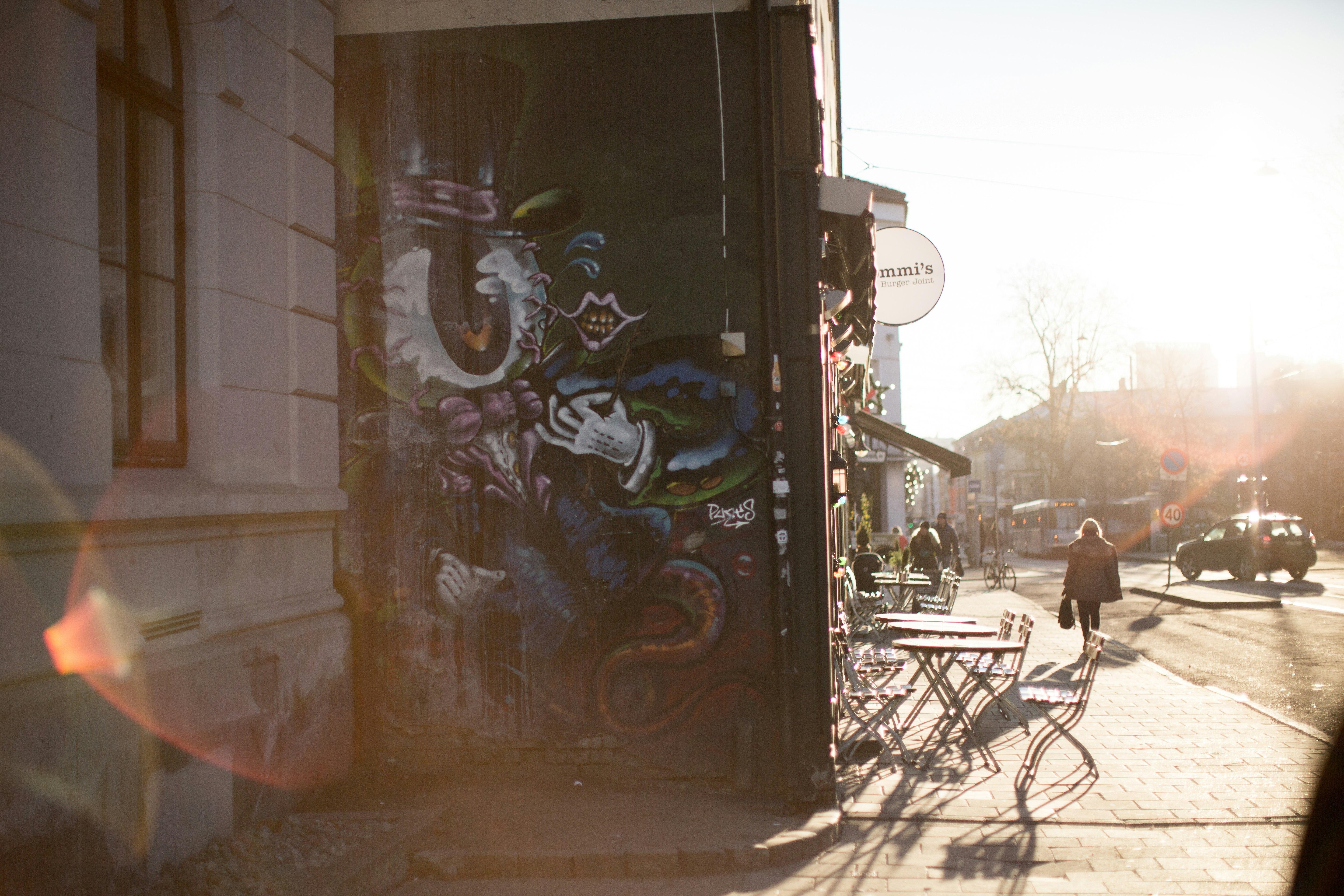 person walking near streets during daytime