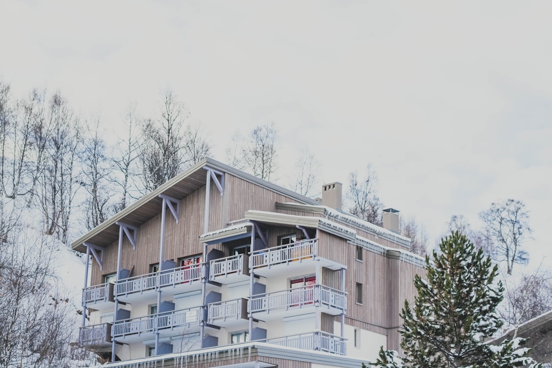 architectural photography of white and brown house, Winter Cabin