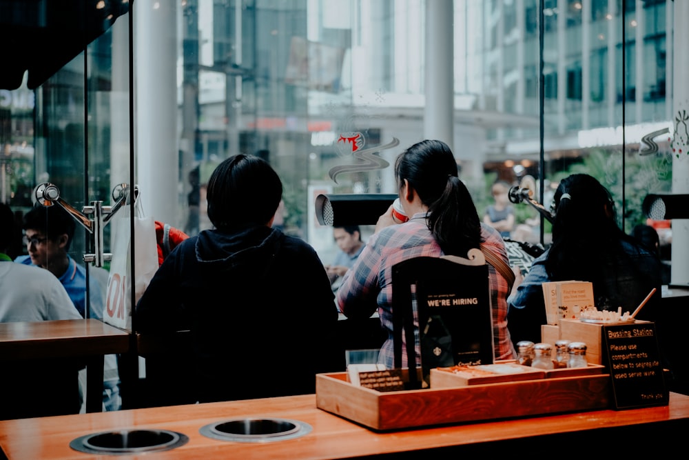 people sitting in restaurant