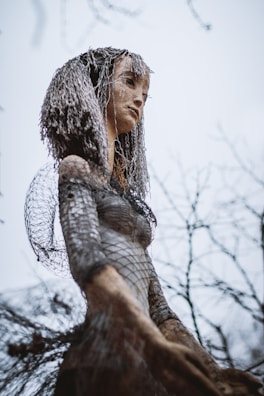 A detailed sculpture made from mixed materials with organic shapes.