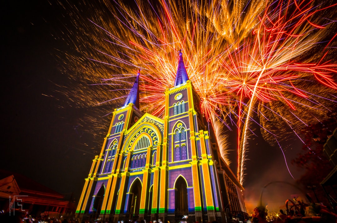 church and fireworks display during night time