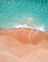 aerial photography of two person sunbathing on riviera maya