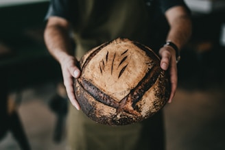 person holding toasted bread