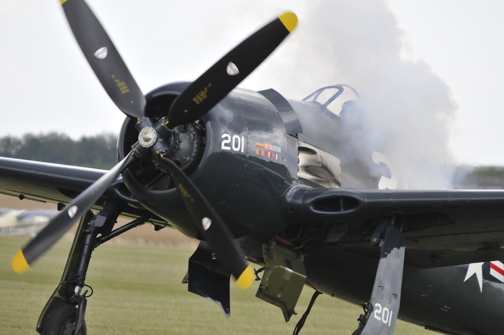 black plane during daytime