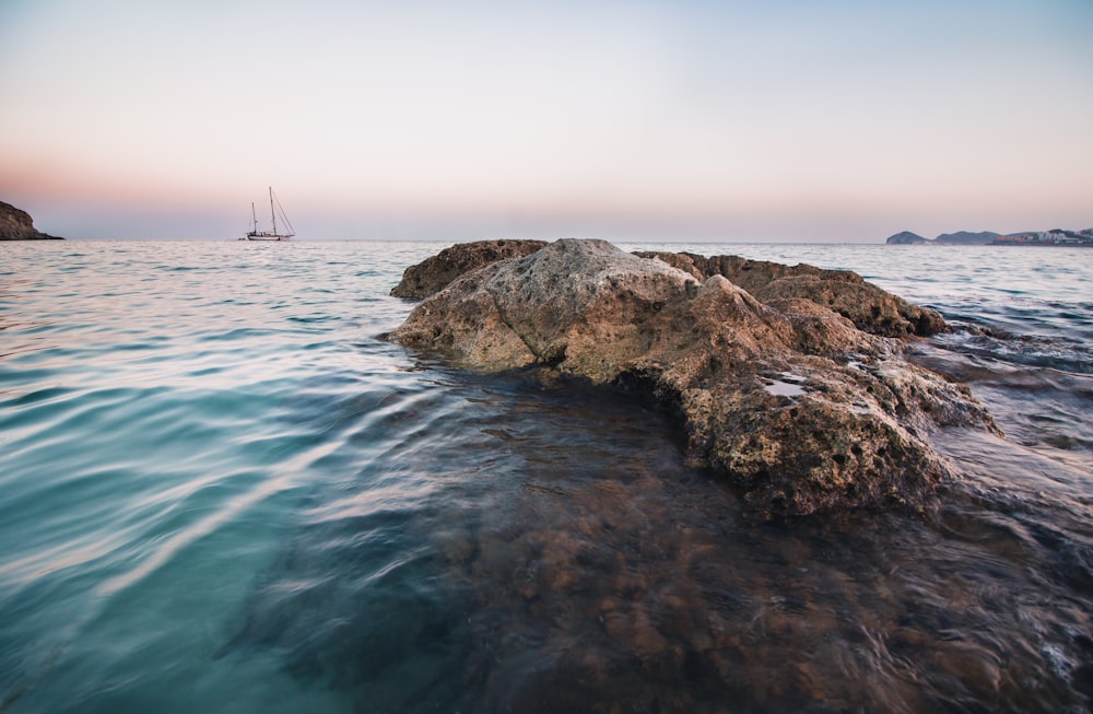 brown rocks on shore