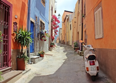 white motor scooter near building in a Italian street