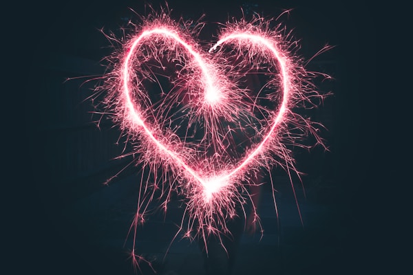 heart shaped pink sparklers photography