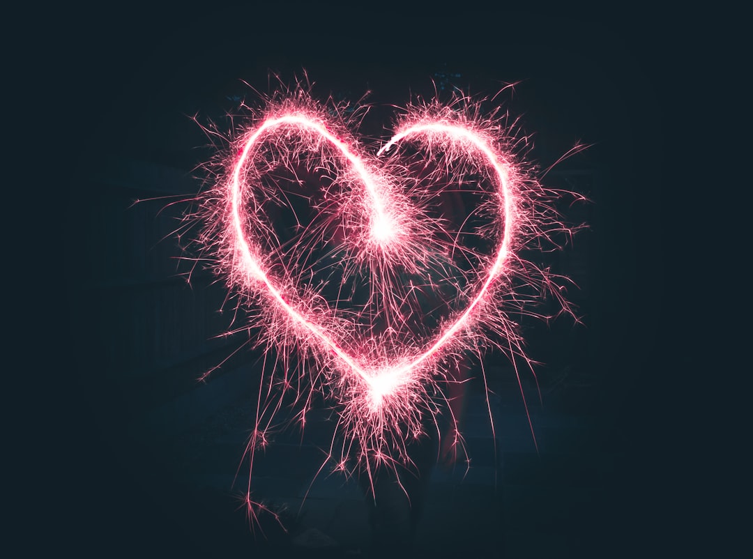 heart shaped pink sparklers photography,